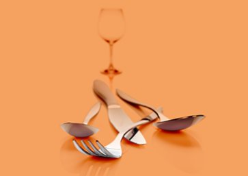 food utensils in orange background